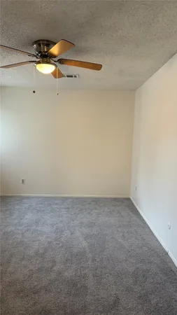 a view of a living room with a window