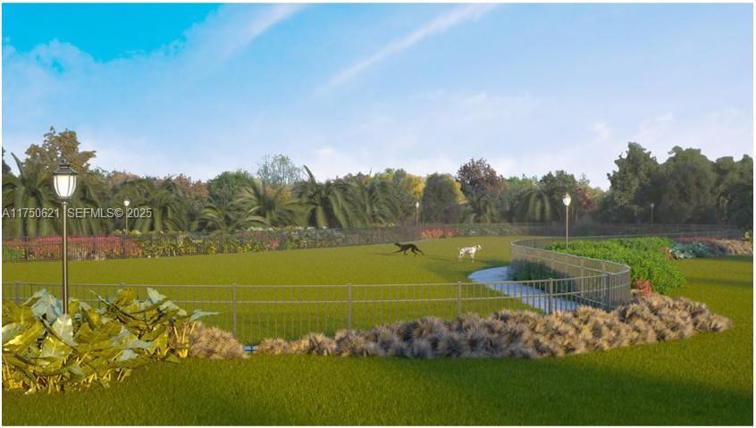 12909 Northwest 23rd Place, Unit 12909 Miami, FL 33167 - Photo 3 of 34 a view of a golf course with a field