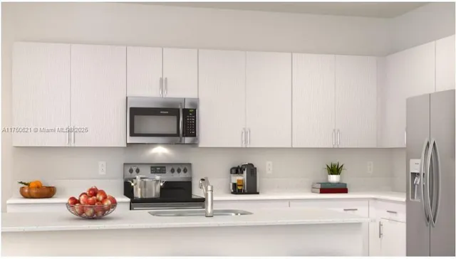 a kitchen with a cabinets and a fireplace