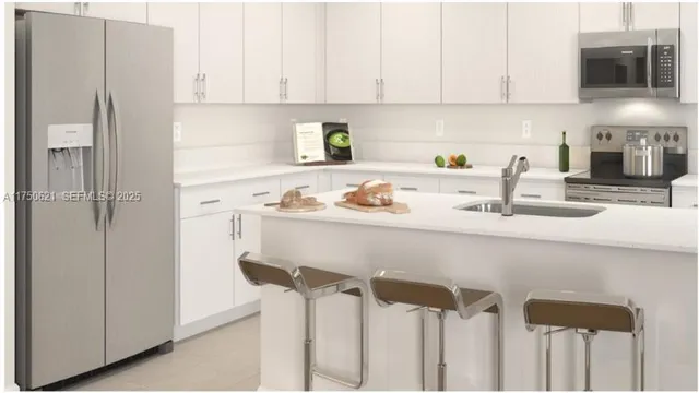 $625,000 | 12909 Northwest 23rd Place, Unit 12909, Miami, FL 33167