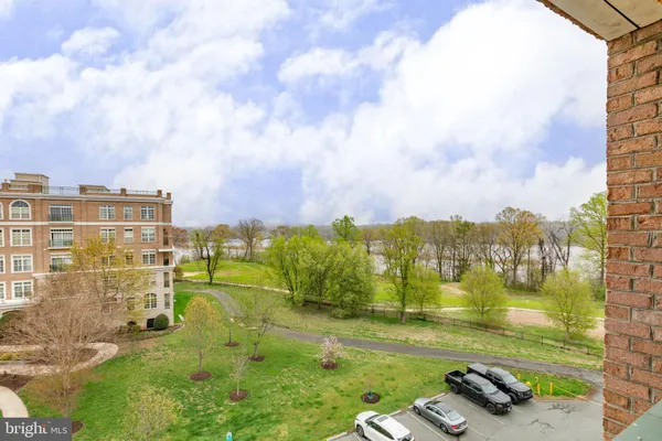 a view of a building with a yard