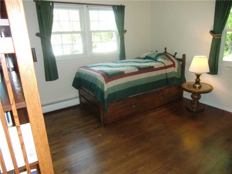 2 Revere Road Riverside, CT 06878 - Photo 12 of 13 a bedroom with a bed and a window