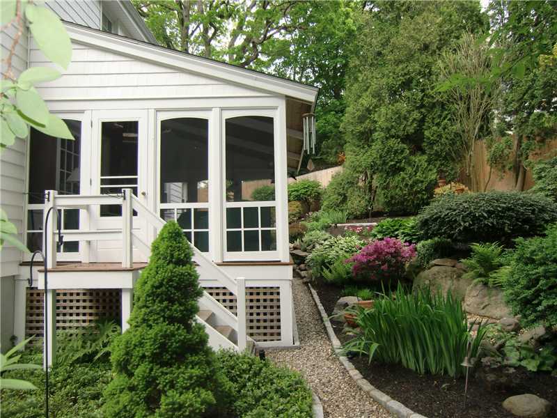 2 Revere Road Riverside, CT 06878 - Photo 2 of 13 a view of a house with potted plants