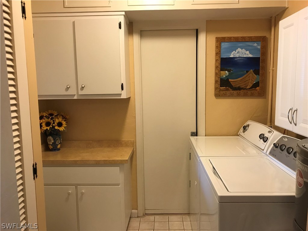 1439 Collins Road Fort Myers, FL 33919 - Photo 17 of 20 a utility room with dryer and washer