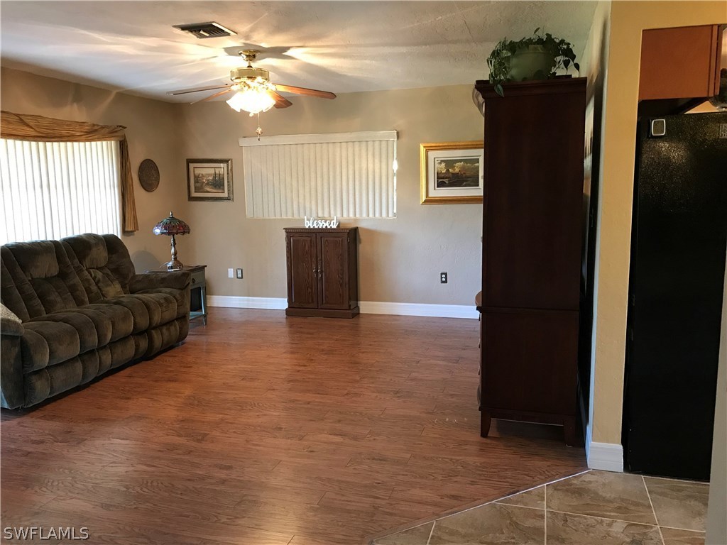1439 Collins Road Fort Myers, FL 33919 - Photo 10 of 20 a living room with furniture and a window