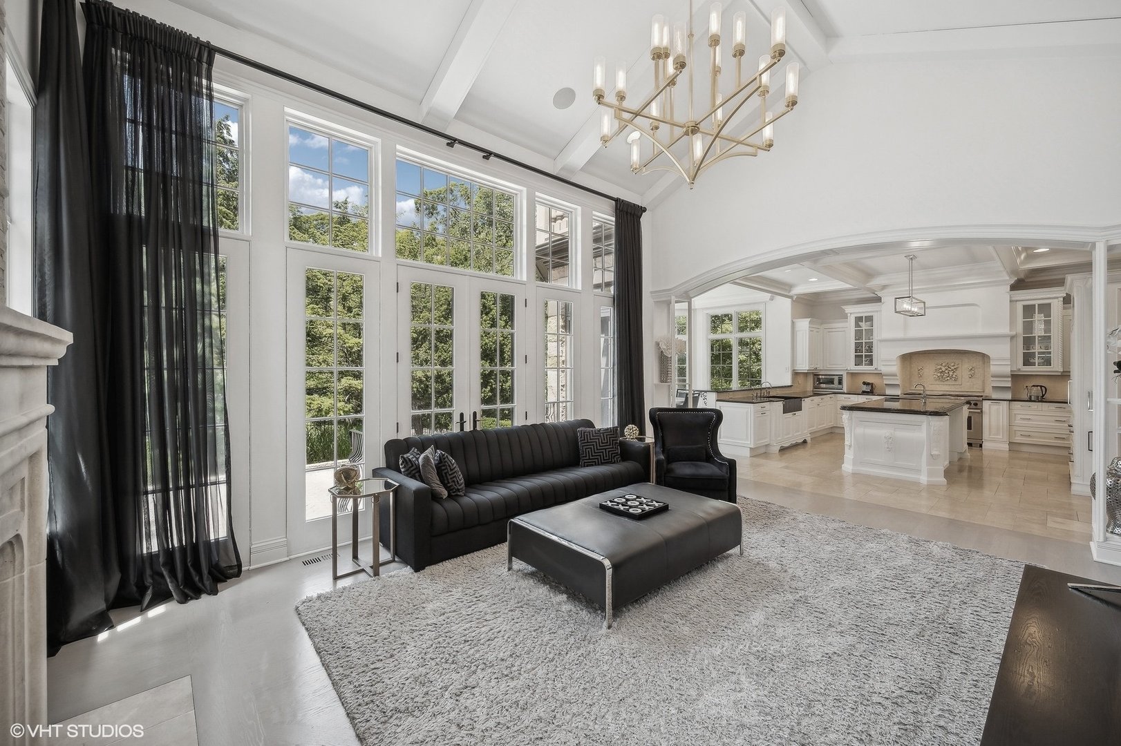 67 Beach Road Glencoe, IL 60022 - Photo 11 of 43 a living room with furniture and a large window