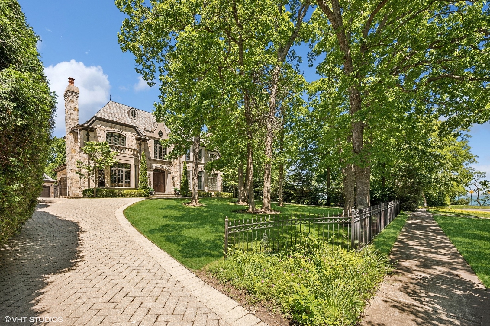 67 Beach Road Glencoe, IL 60022 - Photo 2 of 43 front view of a house with a yard