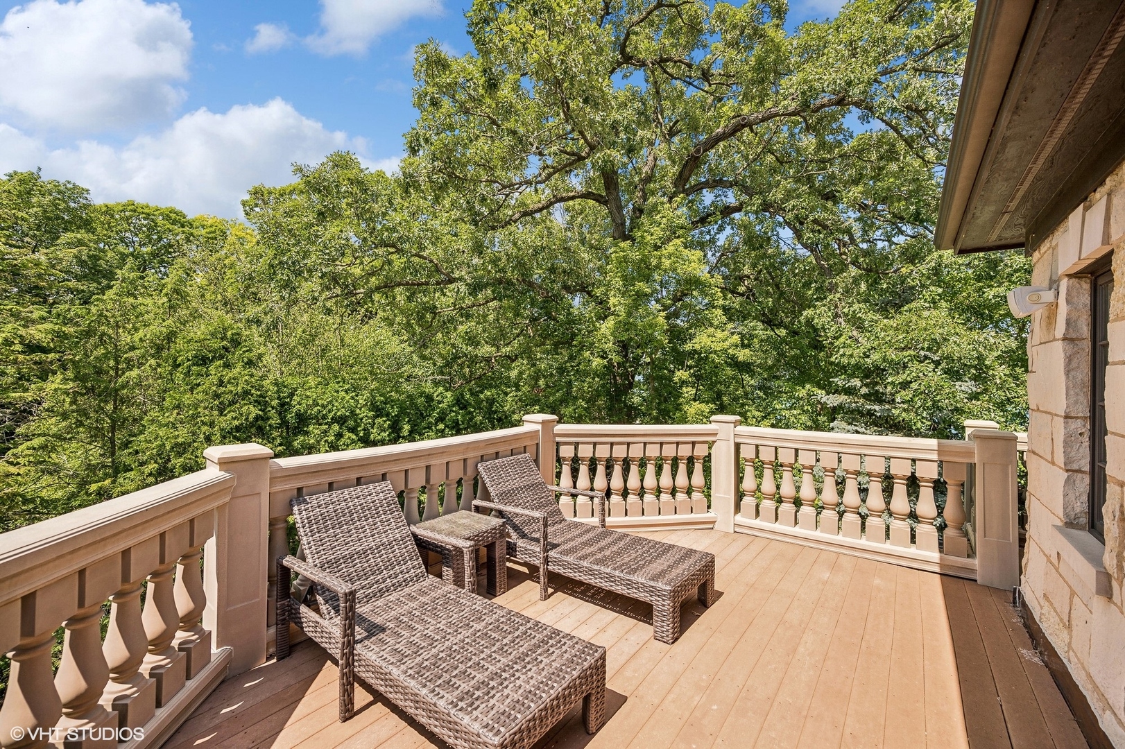 67 Beach Road Glencoe, IL 60022 - Photo 22 of 43 a view of balcony with wooden floor and outdoor seating