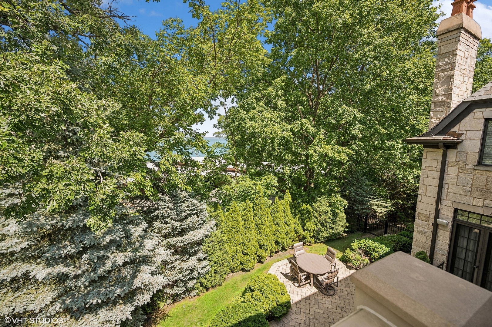 67 Beach Road Glencoe, IL 60022 - Photo 33 of 43 a view of a backyard with sitting area