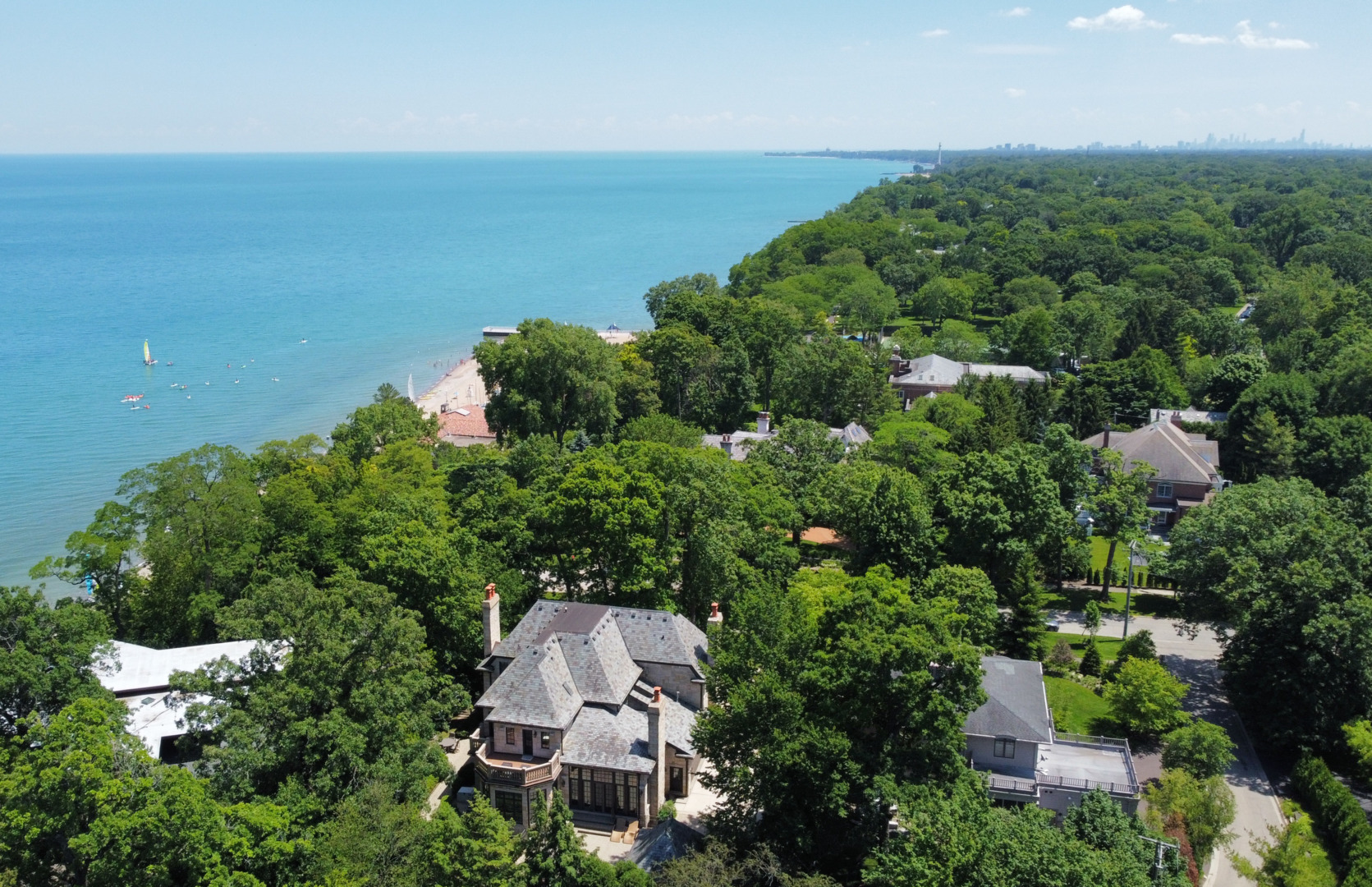 67 Beach Road Glencoe, IL 60022 - Photo 35 of 43 an aerial view of a house with a yard and lake view