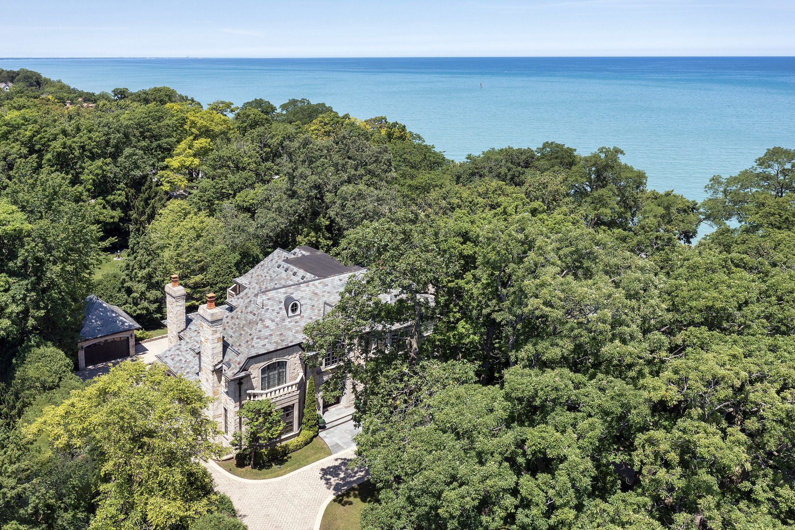 67 Beach Road Glencoe, IL 60022 - Photo 37 of 43 an aerial view of a house with a garden