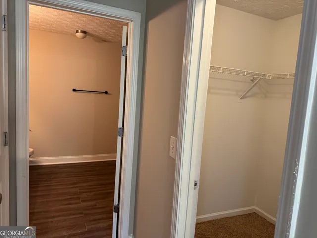 a bathroom with a glass door shower