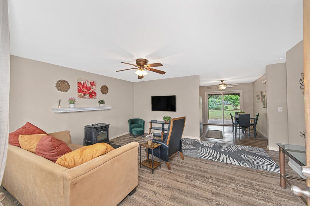 6689 Rhodes Avenue Placerville, CA 95667 - Photo 12 of 60 a living room with furniture and a flat screen tv