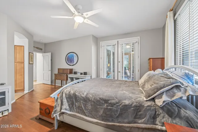 a view of a backyard with plants and lake view