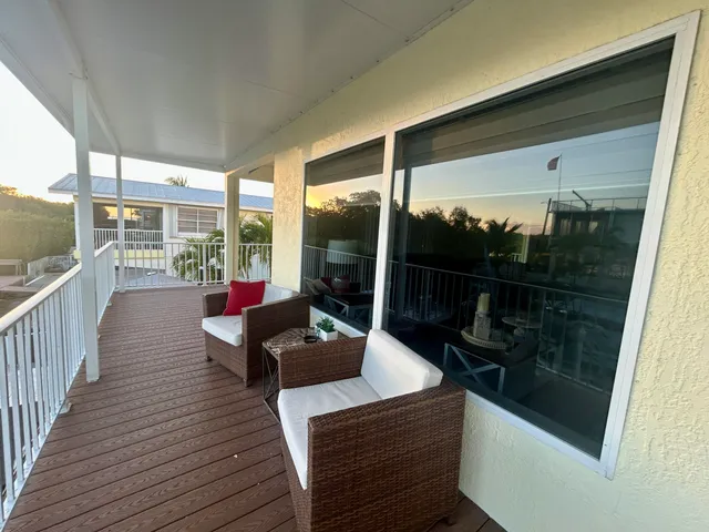 a building outdoor space with patio furniture