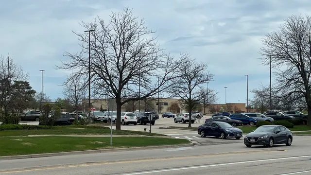 a view of a cars parked on the side of the road