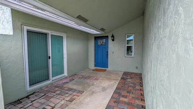 a kitchen with stainless steel appliances a refrigerator and a stove