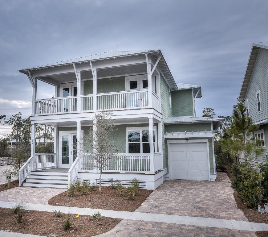 107 Flatwoods Forest Loop Santa Rosa Beach, FL 32459 - Photo 2 of 21 a front view of a house with yard