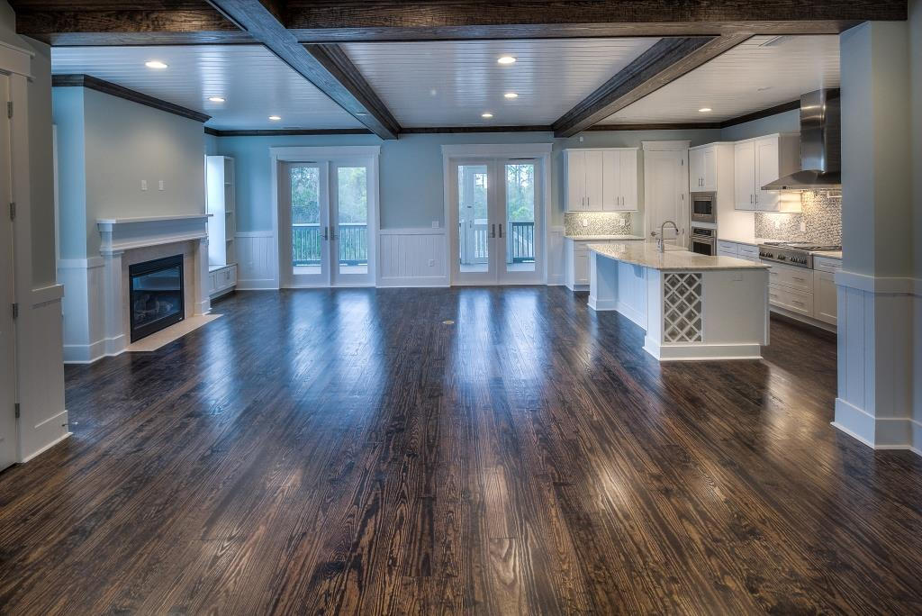 107 Flatwoods Forest Loop Santa Rosa Beach, FL 32459 - Photo 8 of 21 a view of a kitchen with a dishwasher and wooden floor