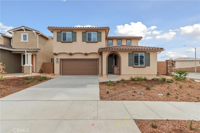 a view of a white house with a yard