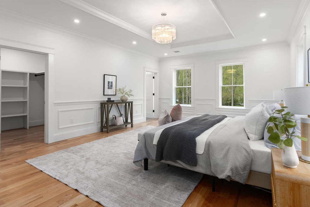 82 Deer Path Lane Weston, MA 02493 - Photo 22 of 42 a bedroom with a bed and a television