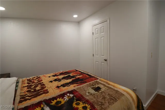 a bathroom with a sink vanity granite and a mirror