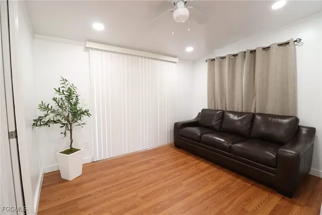 a view of a porch with wooden floor