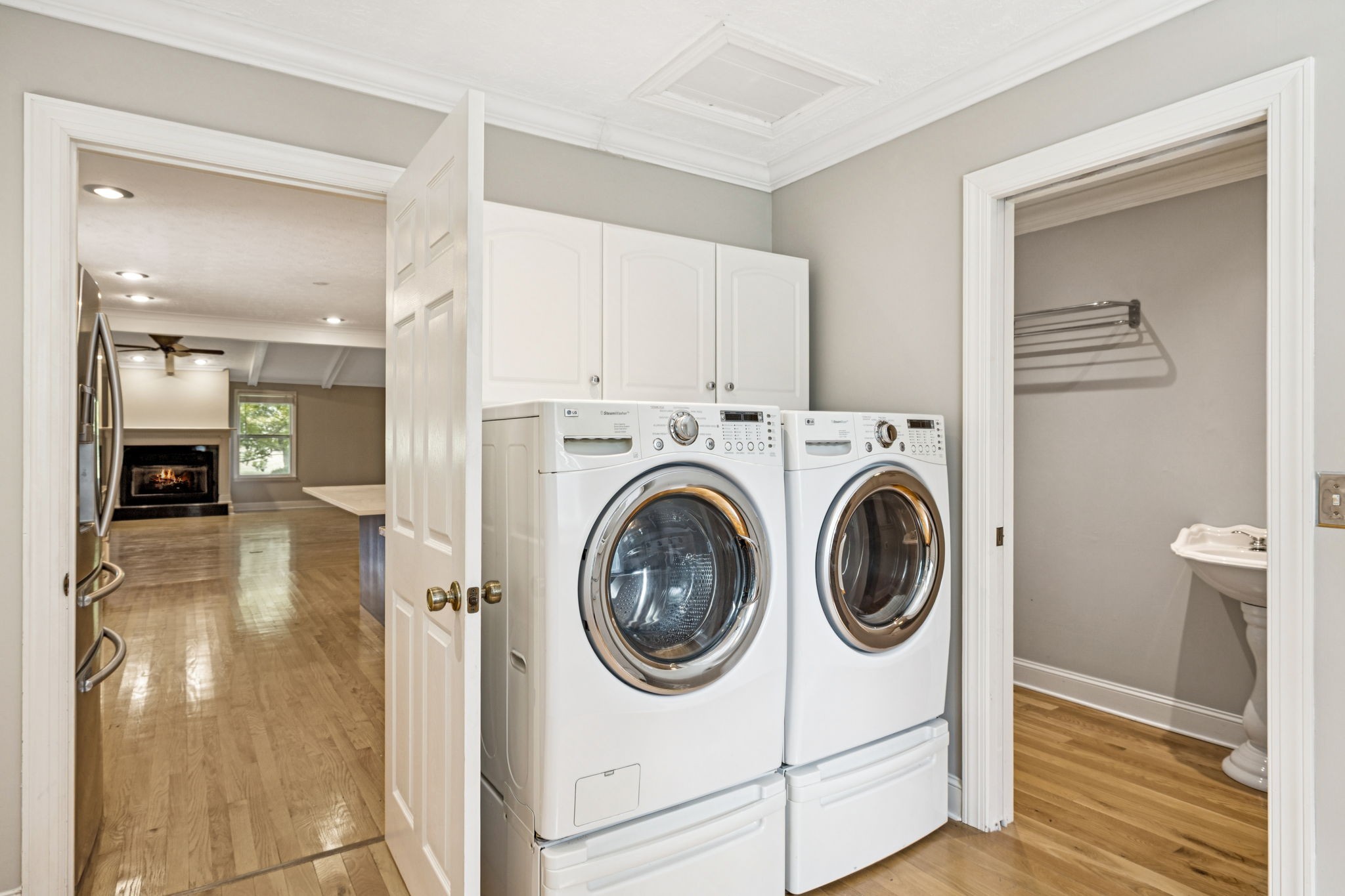 7144 Carter Road Fairview, TN 37062 - Photo 14 of 39 a view of a hallway with washer and dryer