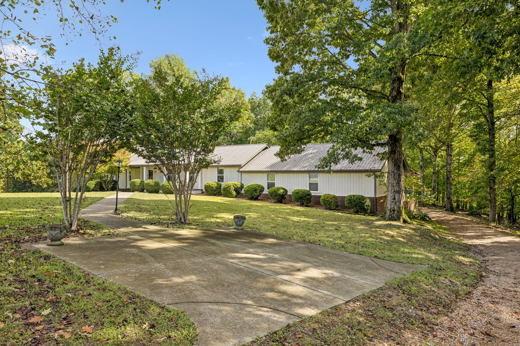 7144 Carter Road Fairview, TN 37062 - Photo 3 of 39 a view of a house with a yard and tree s
