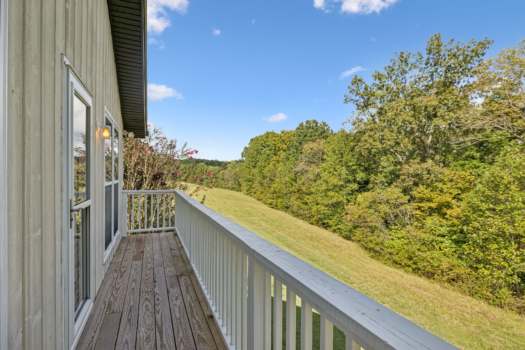 7144 Carter Road Fairview, TN 37062 - Photo 37 of 39 a view of balcony with wooden floor and fence