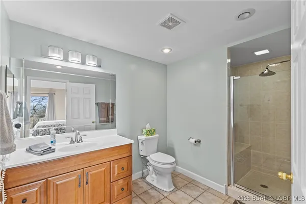 $400,000 | 54 Buoyant Place, Osage Beach, MO 65065