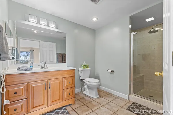 $400,000 | 54 Buoyant Place, Osage Beach, MO 65065