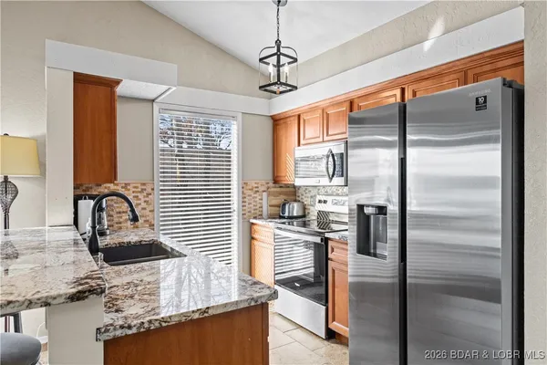 $400,000 | 54 Buoyant Place, Osage Beach, MO 65065
