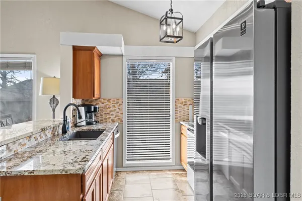 $400,000 | 54 Buoyant Place, Osage Beach, MO 65065