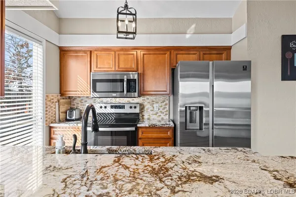 $400,000 | 54 Buoyant Place, Osage Beach, MO 65065