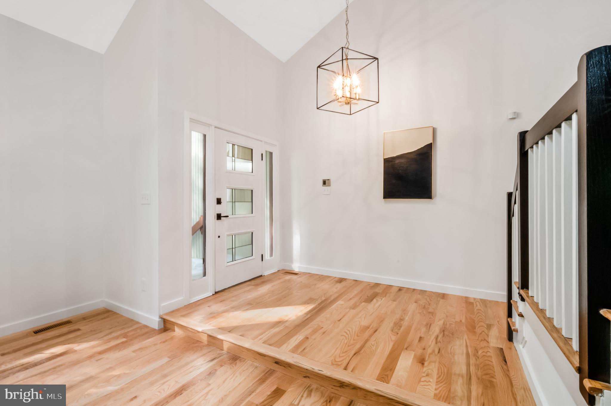 9501 Watts Road Great Falls, VA 22066 - Photo 11 of 73 Gracious entry foyer with designer chandelier