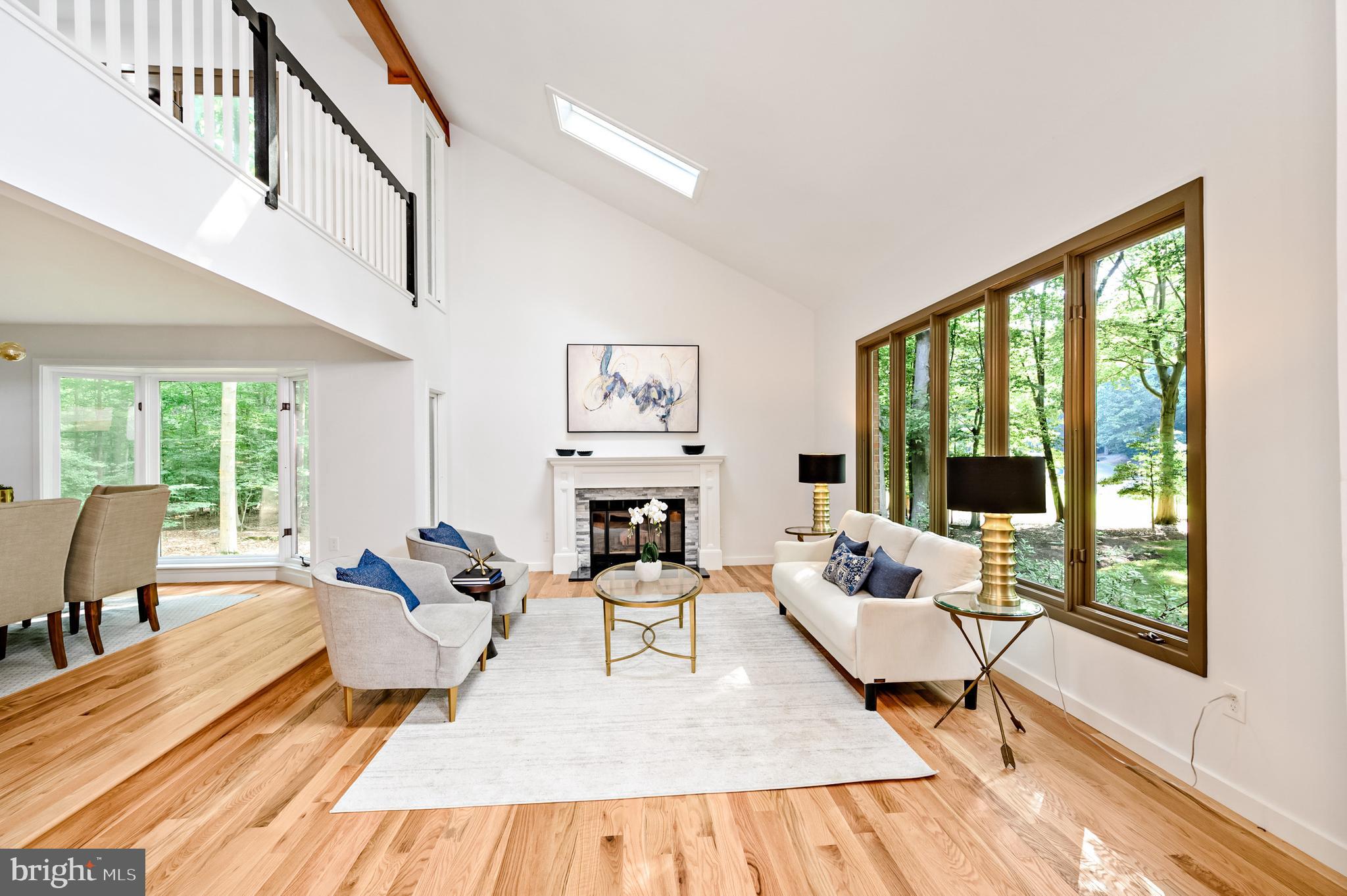 9501 Watts Road Great Falls, VA 22066 - Photo 17 of 73 Vaulted ceiling, skylights in living room