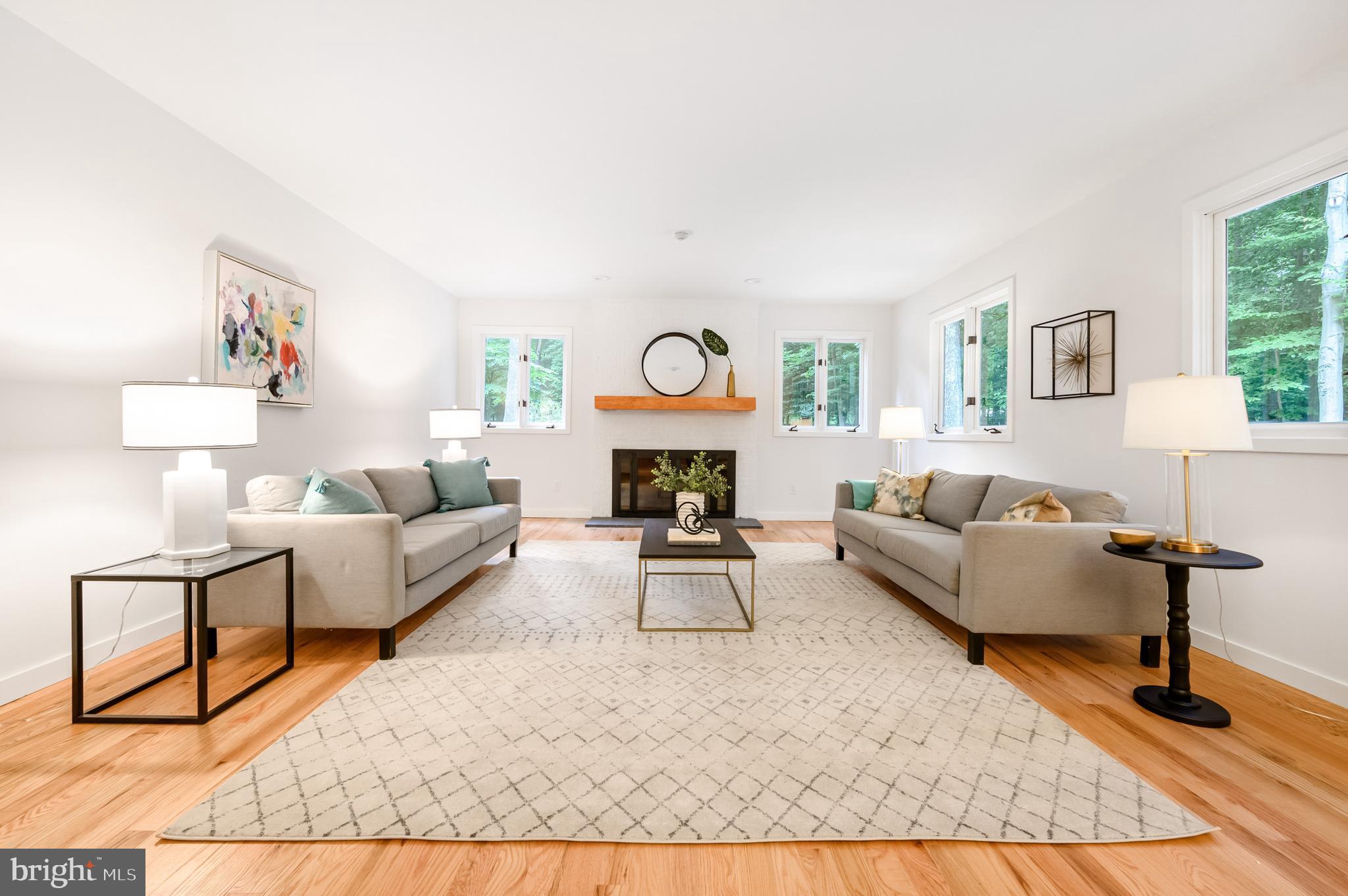9501 Watts Road Great Falls, VA 22066 - Photo 31 of 73 Spacious family room with fireplace