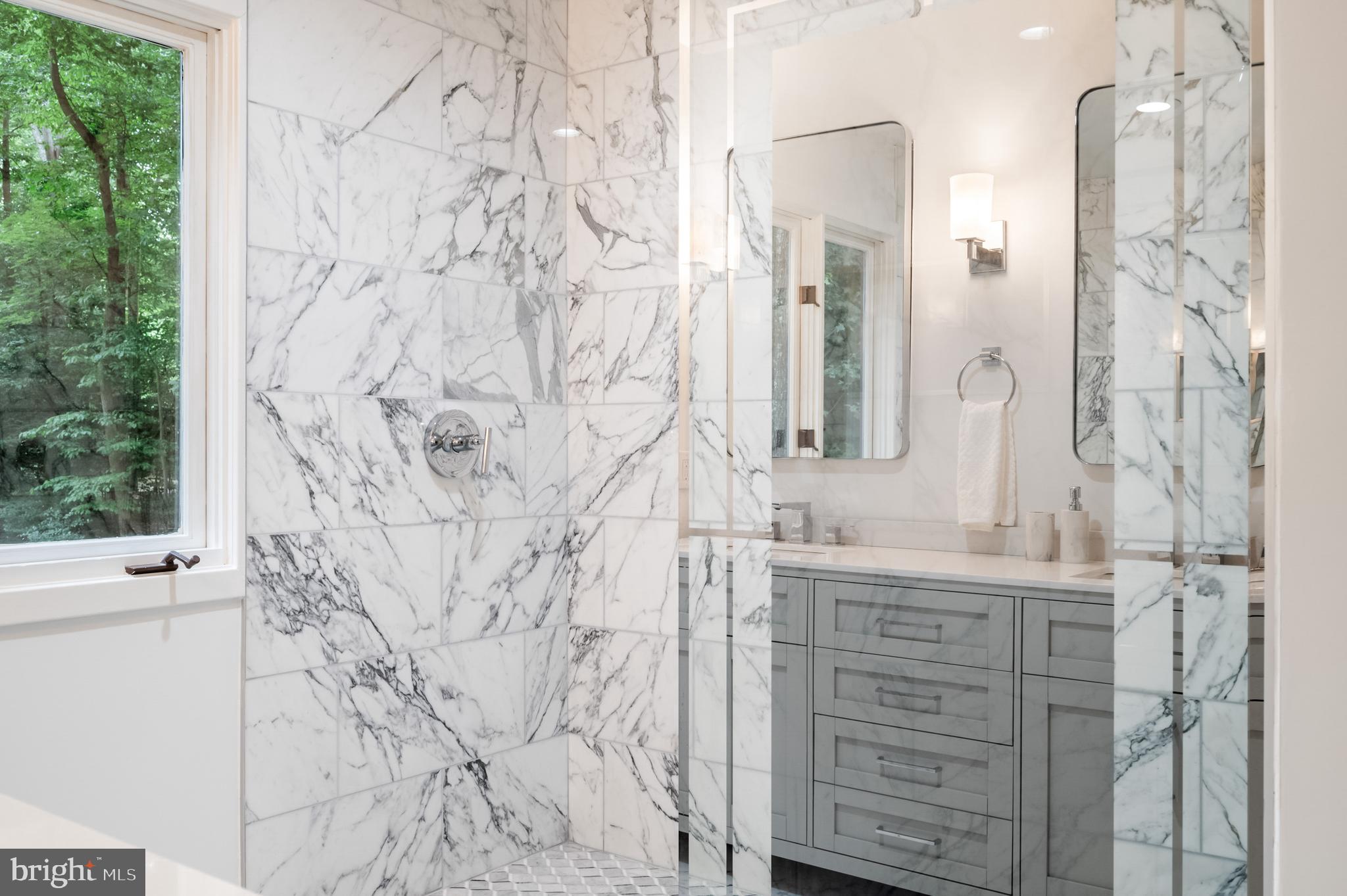 9501 Watts Road Great Falls, VA 22066 - Photo 37 of 73 Master marble shower w custom glass screen