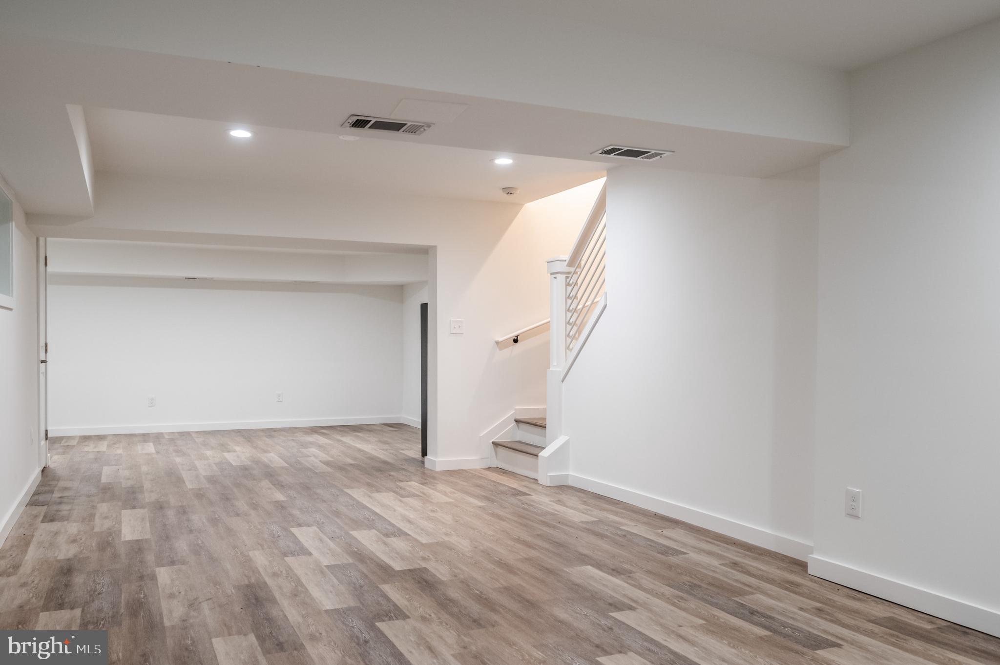 9501 Watts Road Great Falls, VA 22066 - Photo 54 of 73 Newly finished lower level w ceramic floors