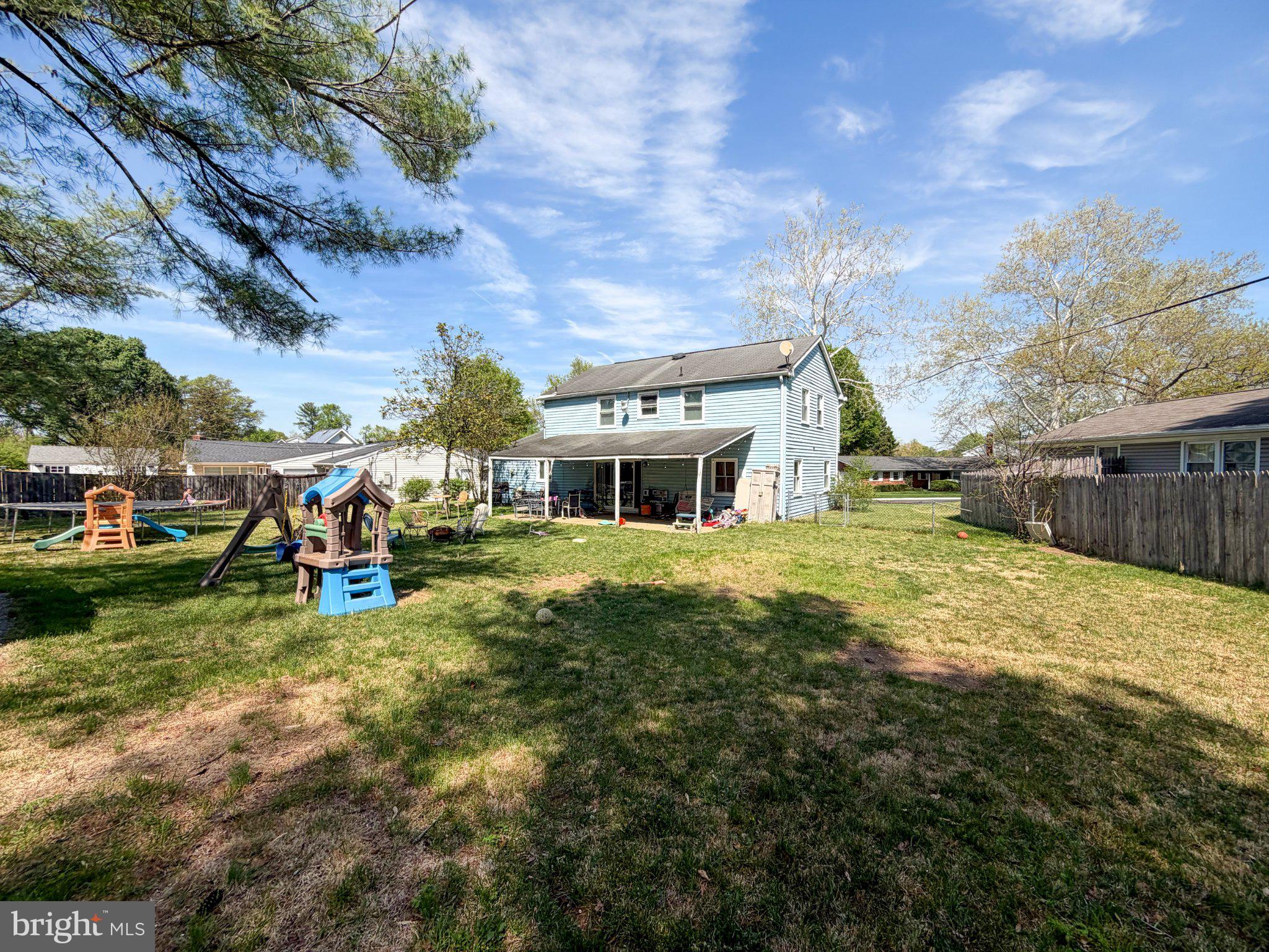 4717 Ramsgate Lane Bowie, MD 20715 - Photo 2 of 9 Spacious backyard with playful charm.