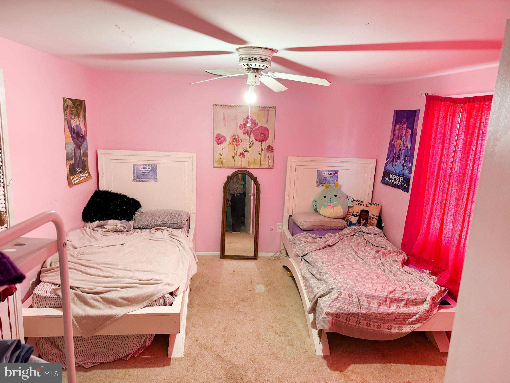 4717 Ramsgate Lane Bowie, MD 20715 - Photo 7 of 9 Charming pink-hued shared bedroom.