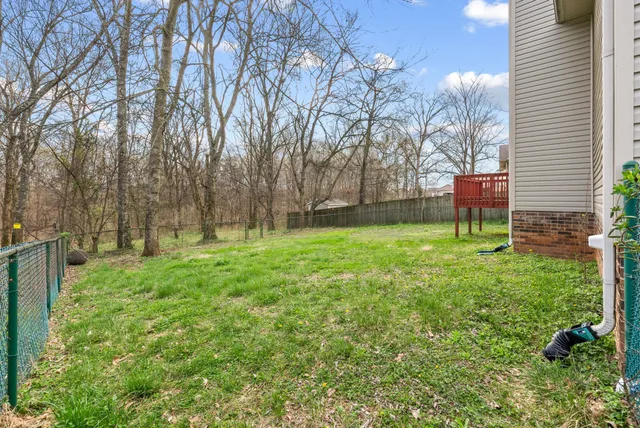 a view of a backyard with a garden