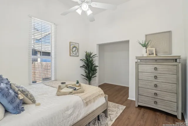 a bedroom with a bed and a dresser
