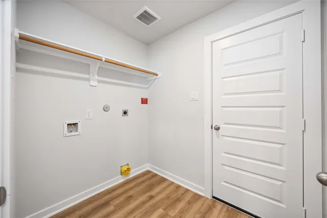 a view of small space with racks on the wall