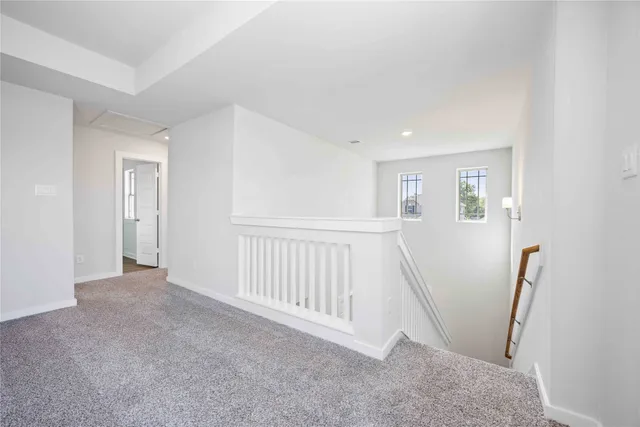 a view of a room that has a window in it