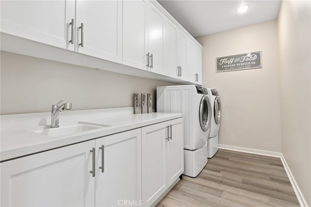 36 Jarano Street Rancho Mission Viejo, CA 92694 - Photo 15 of 68 Laundry room w/ tons of cabinets - downstairs