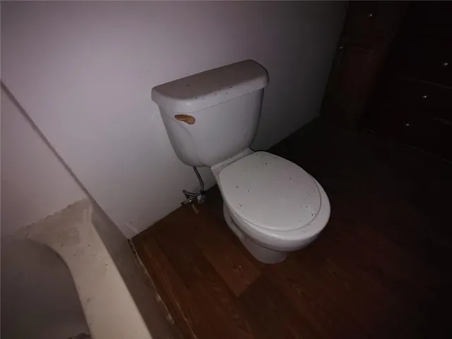 a view of a hallway with a door