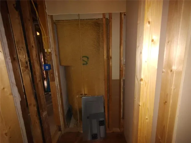 a view of a balcony with wooden floor and furniture