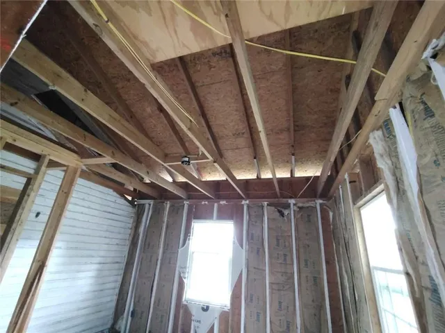 a view of a room with a large window